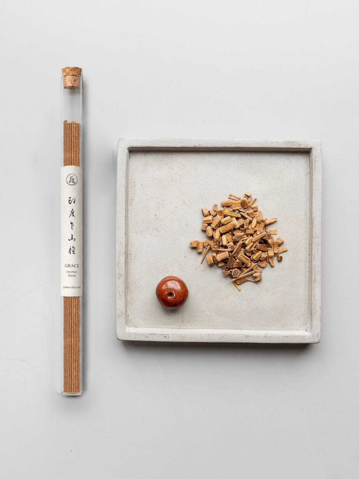 GRACE incense sticks in a cork-stoppered glass tube