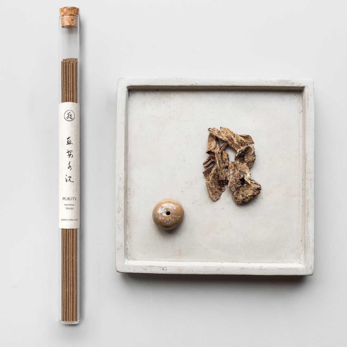 PURITY incense sticks in a cork-stoppered glass tube