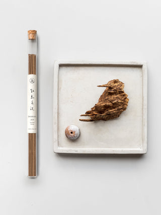 DHARMA JOY incense sticks in a cork-stoppered glass tube