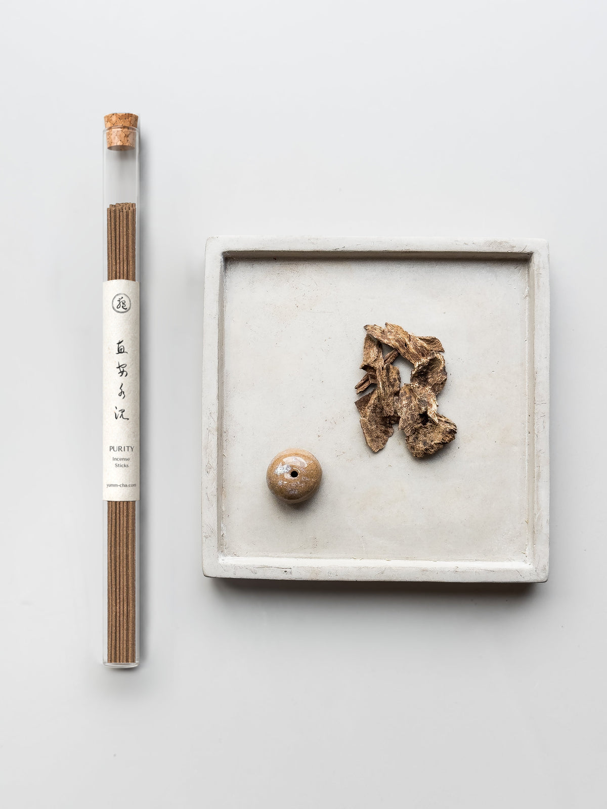 PURITY incense sticks in a cork-stoppered glass tube