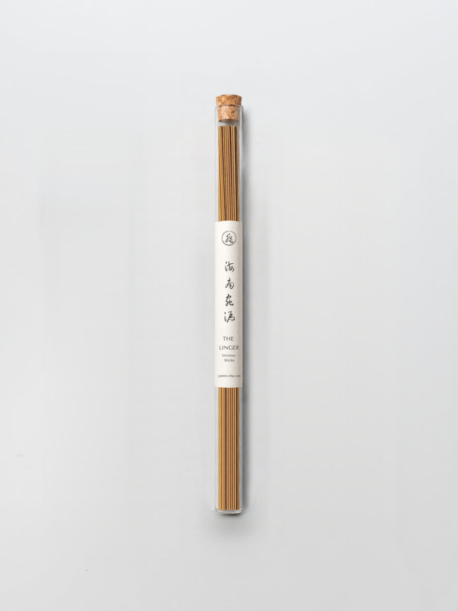 THE LINGER incense sticks in a cork-stoppered glass tube